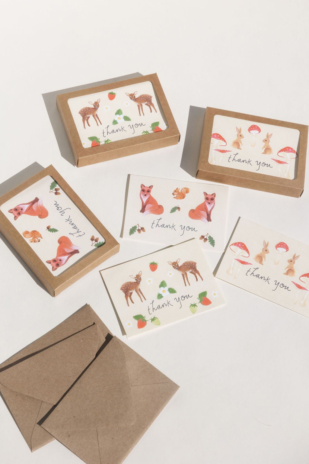 Our new forest creatures designs. Shown in kraft boxes.