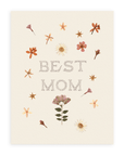 "Best Mom" pressed flowers card against a white background.