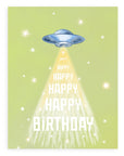 Greeting card with green background featuring stars and flying saucer with "happy birthday" printed down the front. Shown on white background.