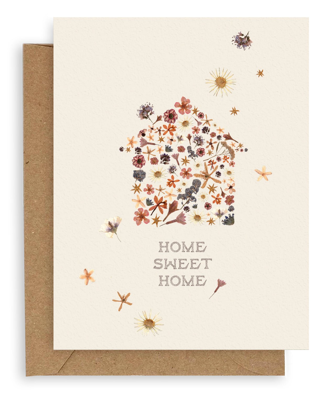 Cream colored background with pressed flowers scattered across dried flora constructed in the shape of a house with the words &quot;Home Sweet Home&quot; printed below. Shown with Kraft envelope.