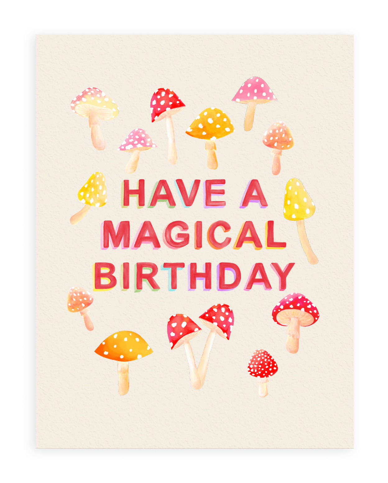 Cream colored card with pink, orange and red mushrooms and red printed text with the words &quot;Have A Magical Birthday&quot; in the middle. Shown on white background.