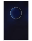 New moon against a dark blue background.