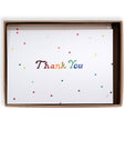  Rainbow stars thank you card with rainbow colored letters printed on white cardstock in kraft packaging.
