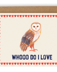 An owl is placed above a line of text that says "whooo do i love" in black font. Red hearts line the sides of the card, printed on a cream background. Shown with kraft envelope.