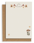 Adelfi monogram "C" notecard with kraft envelopes on a white background.