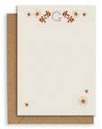 Adelfi monogram "G" notecard with kraft envelopes on a white background.