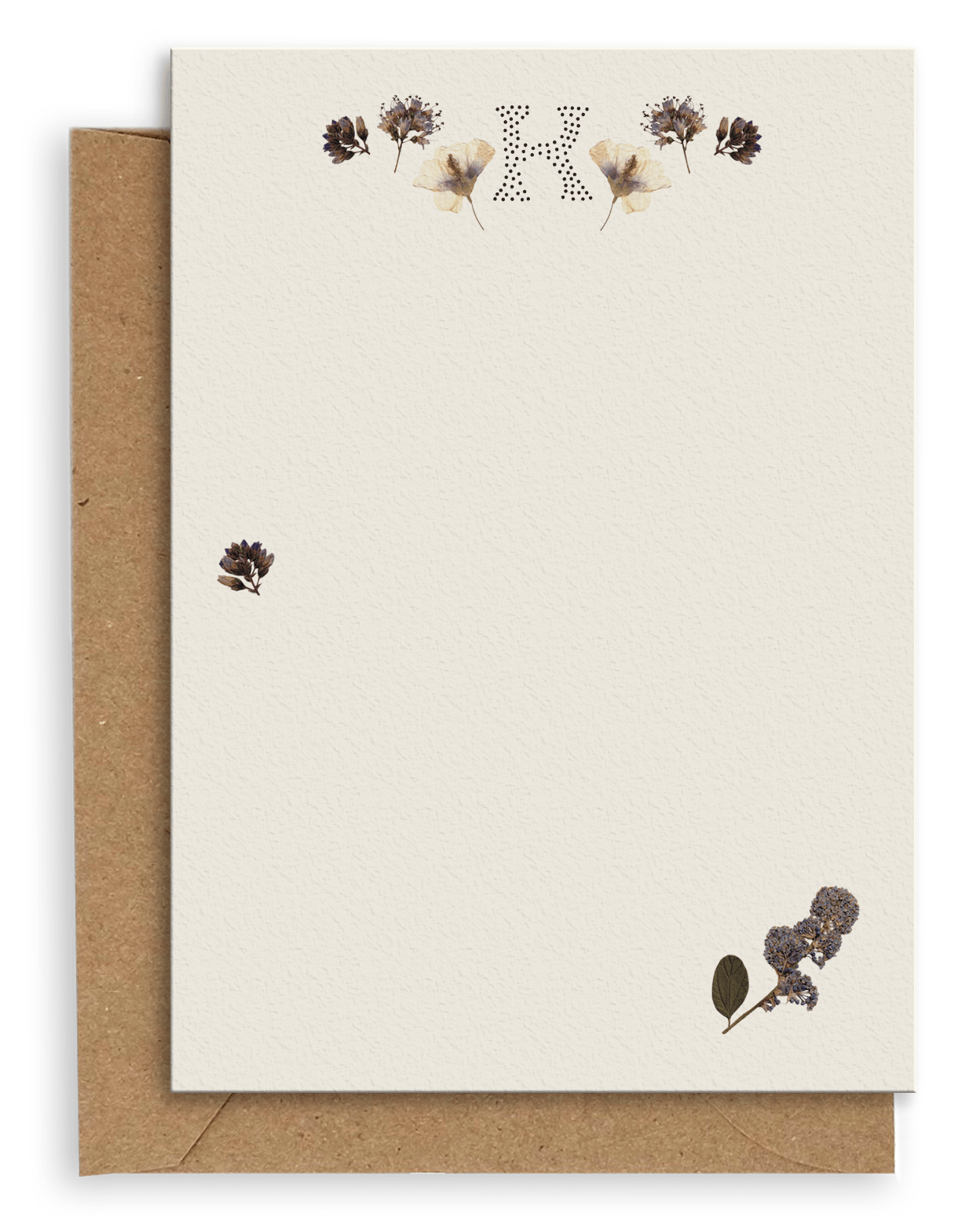 Adelfi monogram "K" notecard with kraft envelopes on a white background.