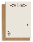 Adelfi monogram "L" notecard with kraft envelopes on a white background.
