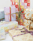 Various Adelfi gift wrap designs.