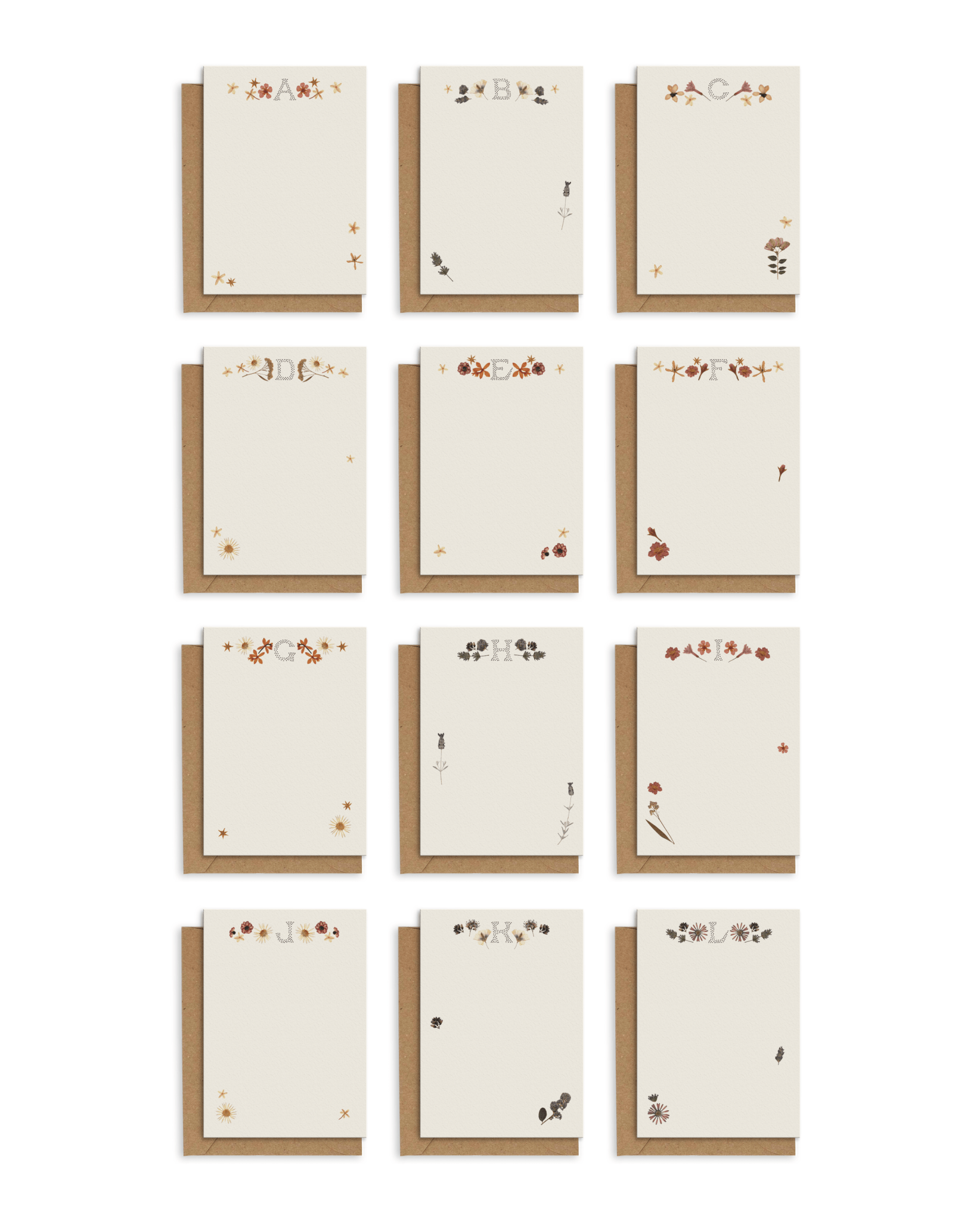Adelfi monogram notecards featuring letters "A" through "L" with  kraft envelopes on a white background.