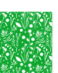 This holiday gift wrap features various kinds of flora printed on a primary green background.