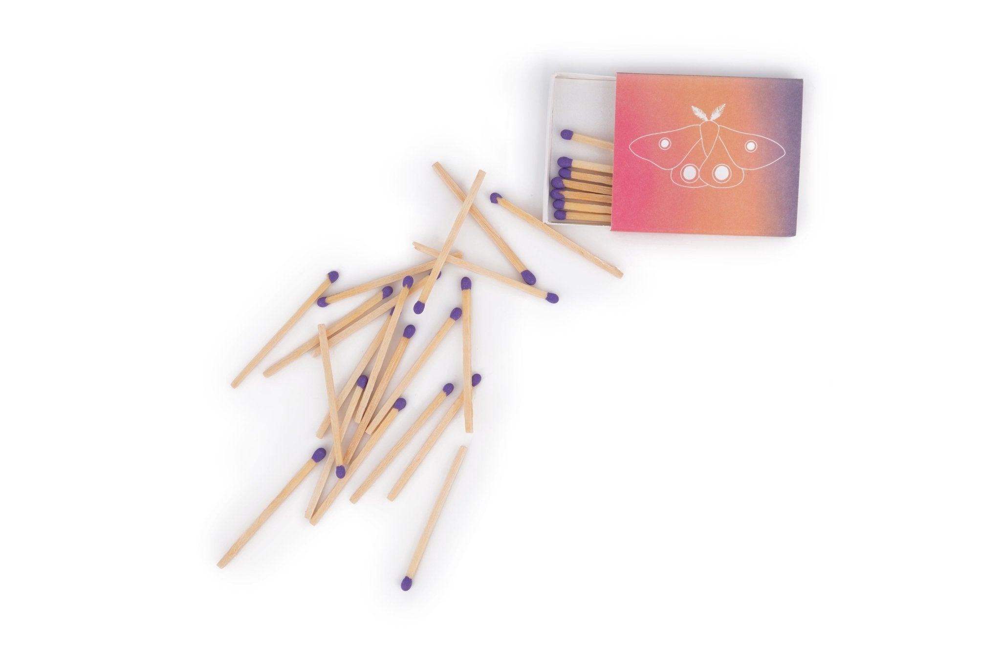 Adelfi matchbox open with purple matches spilling out