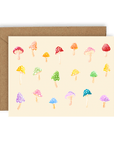 Rainbow colored mushrooms printed on a cream background. Shown with kraft envelope.