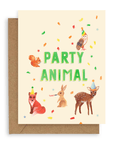 Forest creatures design with confetti, an owl, fox, fawn, rabbit, and squirrel in party hats surrounding the words "party animal" in green printed on a cream colored background. Shown with kraft envelope.