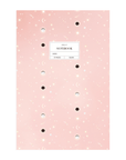 Adelfi notebook with a pink cover with stars and eclipsing moons.