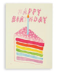 Cream colored card with ombre pink "Happy Birthday" sprinkles design above a rainbow and sprinkles birthday cake with a white background.