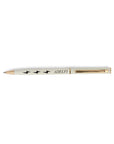 Cream colored Adelfi pen with gold accents and black lightning bolts.