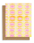 Pink, yellow, and orange tie dye. Shown with kraft envelope. 
