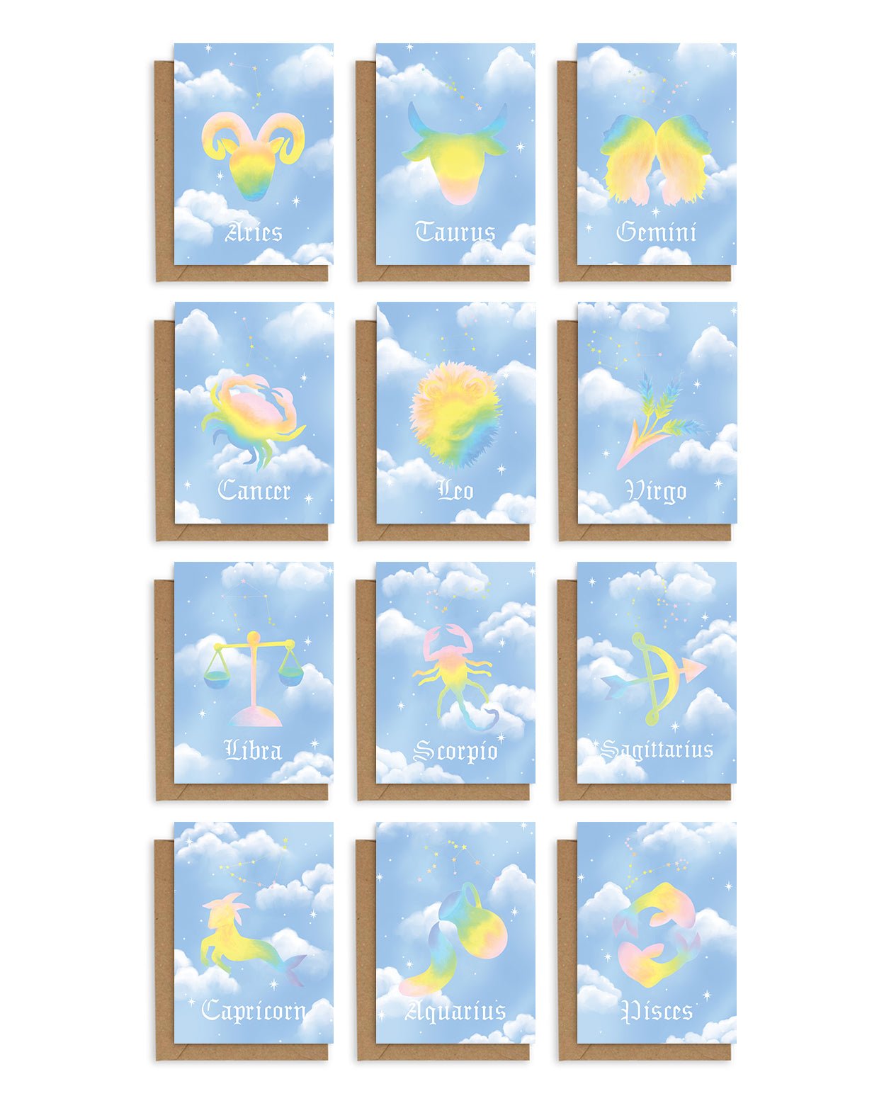 Adelfi Horoscope cards have a light blue background with white clouds and each of the twelve horoscope symbols painted in pastel rainbow colors. Shown with kraft envelope.