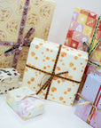 Various Adelfi gift wrap designs.