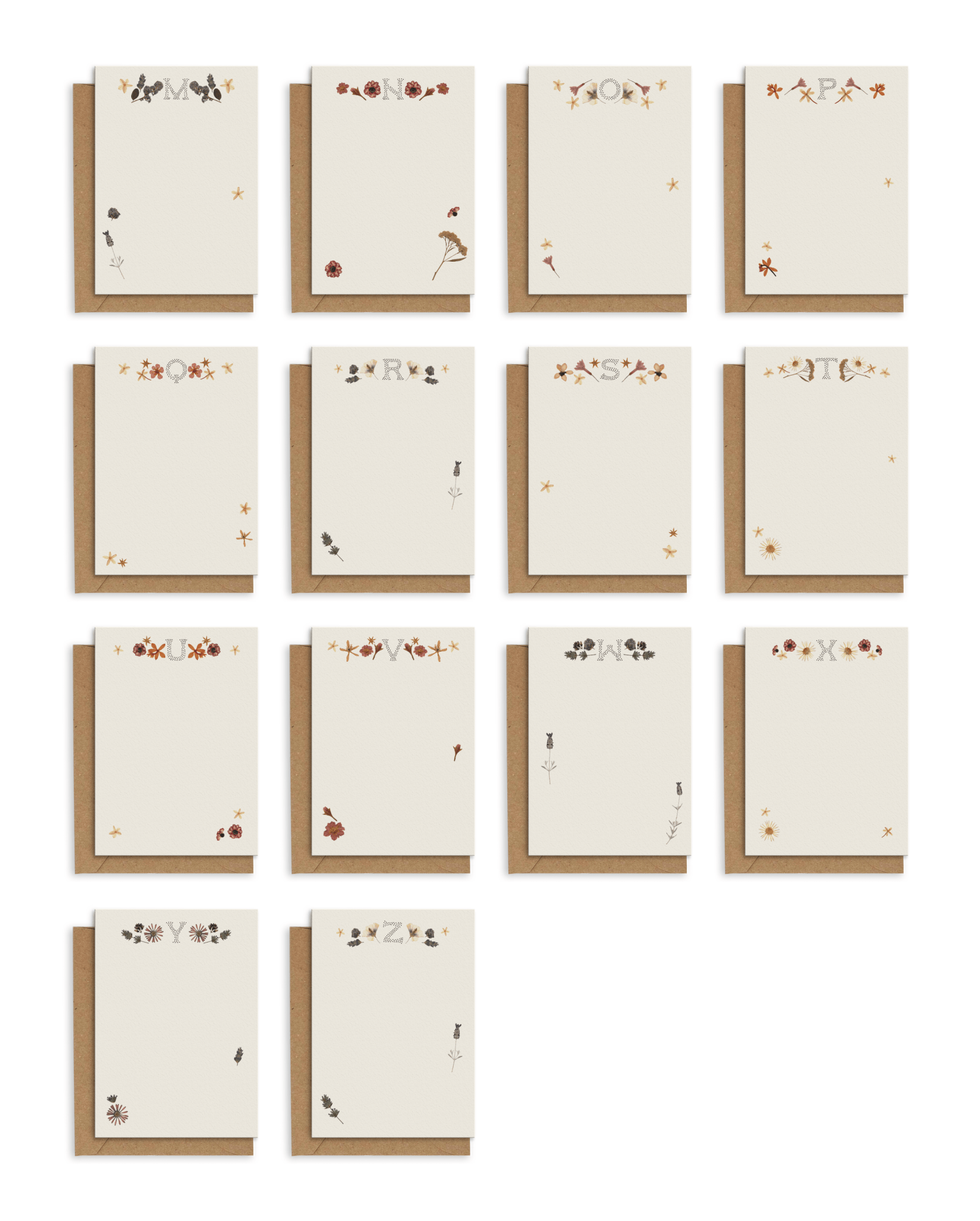 Adelfi monogram notecards featuring letters &quot;M&quot; through &quot;Z&quot; with kraft envelopes on a white background.